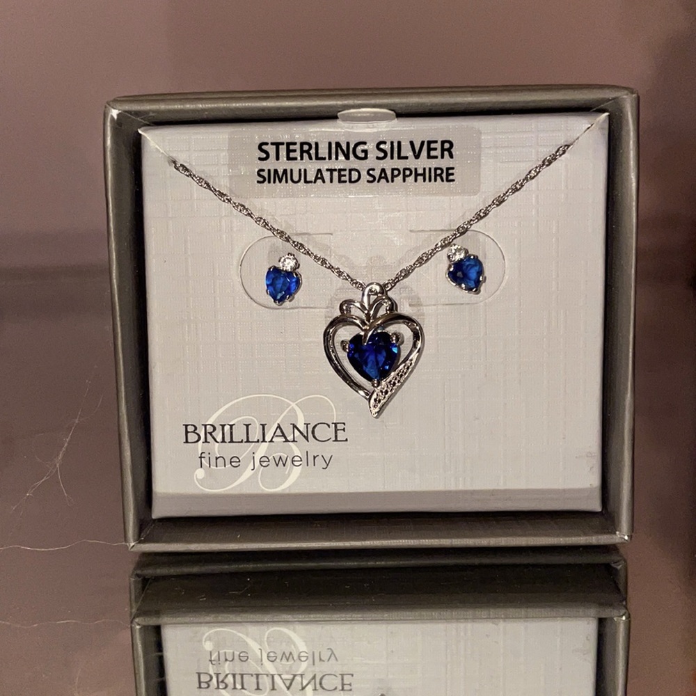 Sterling silver sapphire set